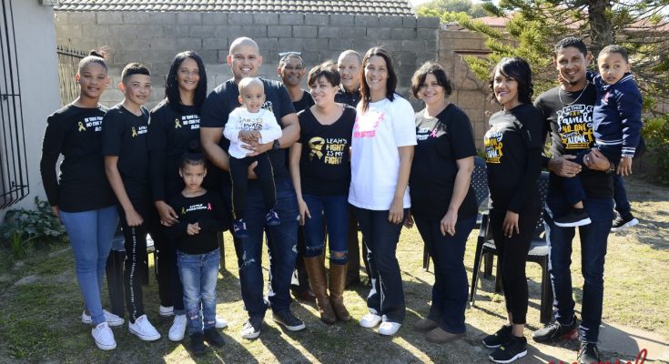 Mita Groenewald (white shirt) with her supportive family