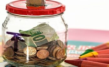 a glass jar with coins inside