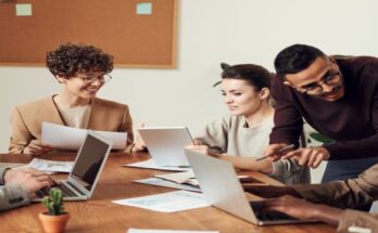 group of people sitting in a office