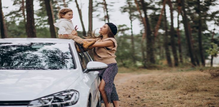 mother-with-her-son-by-car-park