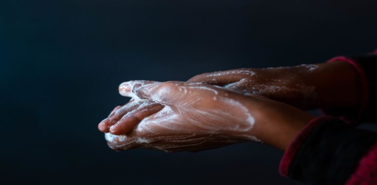 soaped-hands-person-importance-washing-hands-during-coronavirus-pandemic