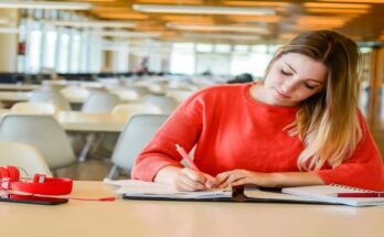 portrait-young-student-studying-university-library-education-lifestyle-concept