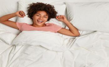 young-brunette-woman-lying-bed