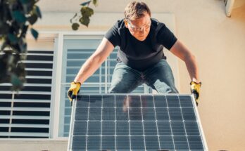person-installing-solar-home