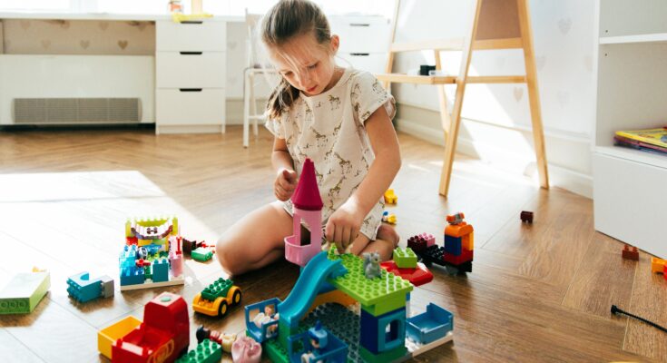 the-girl-sits-on-the-floor-in-the-children-s-room