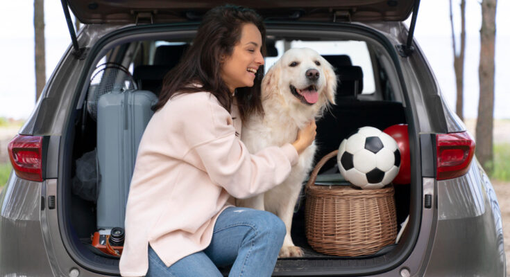 woman-holding-dog-medium-shot