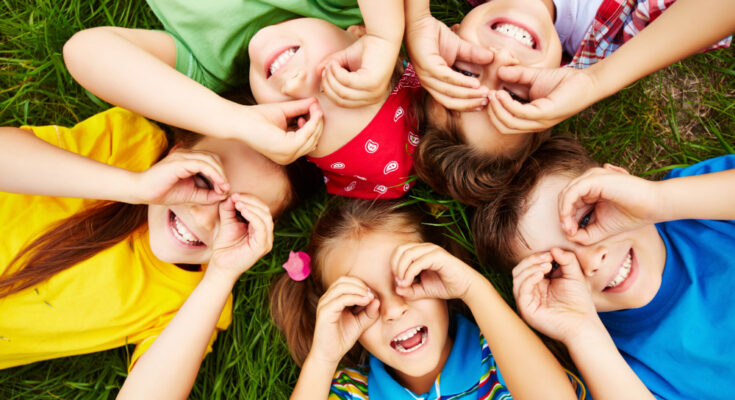 children-playing-grass