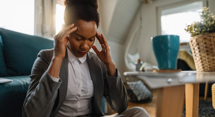 african-american-businesswoman-having-headache-feeling-tired-while-working-home
